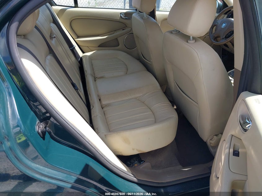 2004 Jaguar X type VIN SAJEB52D04XD67687 IAAI salvage auction — NORMAL WEAR, Clear (Florida), sold $425 on 2026-07-09 (photo 8)