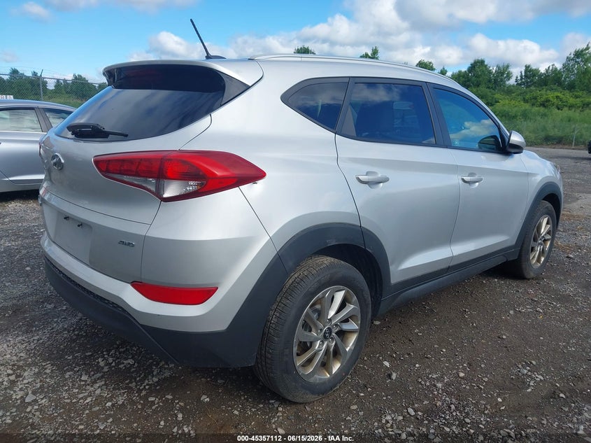 2016 Hyundai Tucson VIN KM8J3CA4XGU137881 IAAI salvage auction — THEFT, Salvage Title, sold $700 on 2026-07-30 (photo 4)