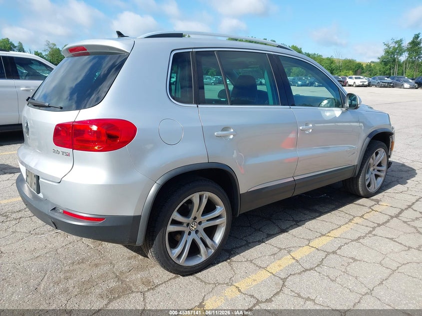 2013 Volkswagen Tiguan VIN WVGAV3AXXDW617729 IAAI salvage auction — RIGHT FRONT, Clear (Michigan), sold $1,175 on 2026-07-13 (photo 4)