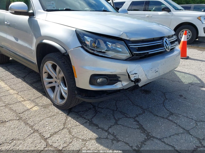 2013 Volkswagen Tiguan VIN WVGAV3AXXDW617729 IAAI salvage auction — RIGHT FRONT, Clear (Michigan), sold $1,175 on 2026-07-13 (photo 6)