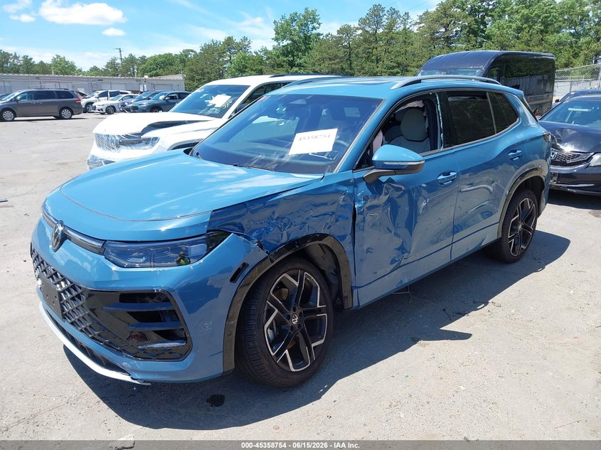 2026 Volkswagen Tiguan VIN 3VVUW7RM4TM038817 IAAI salvage auction — SIDE, Mv-907A (New York), sold $17,700 on 2026-07-09 (photo 2)