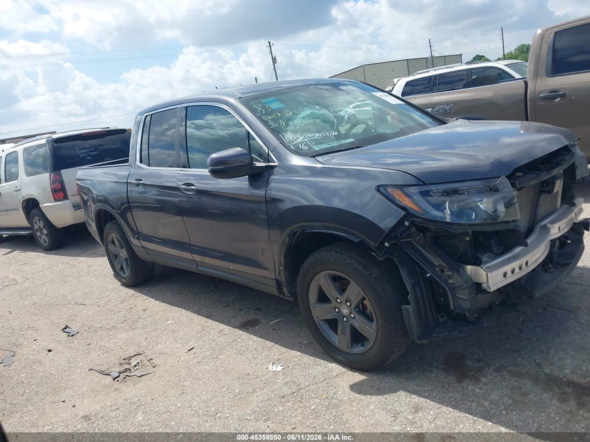 2023 Honda Ridgeline VIN 5FPYK3F5XPB016047 — IAAI salvage auction photo