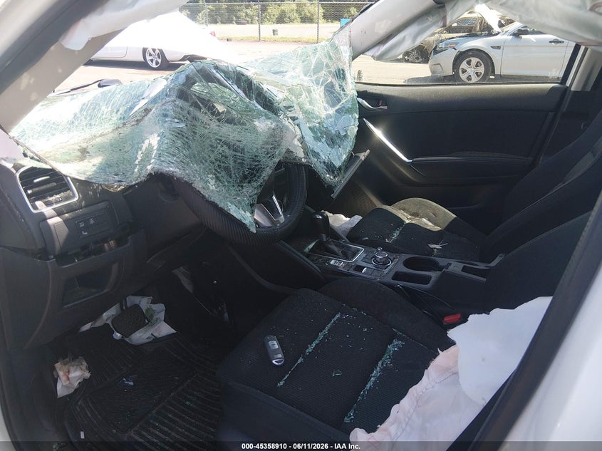 2016 Mazda Cx-5 VIN JM3KE4CY5G0759232 IAAI salvage auction — NORMAL WEAR, Clear (Connecticut), sold $1,350 on 2026-07-16 (photo 5)