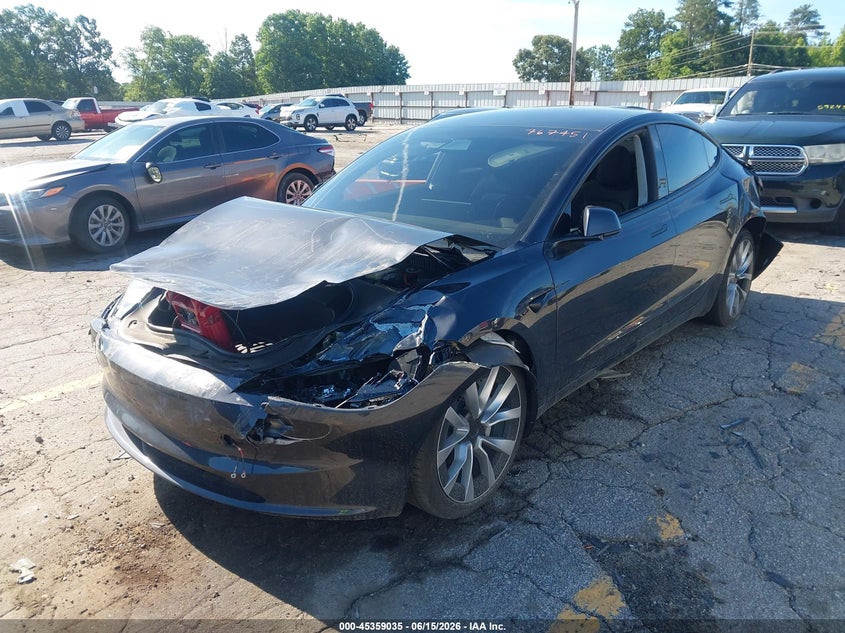 2024 Tesla Model 3 VIN 5YJ3E1EA2RF767451 IAAI salvage auction — FRONT & REAR, Salvage (Georgia), sold $5,600 on 2026-08-22 (photo 2)