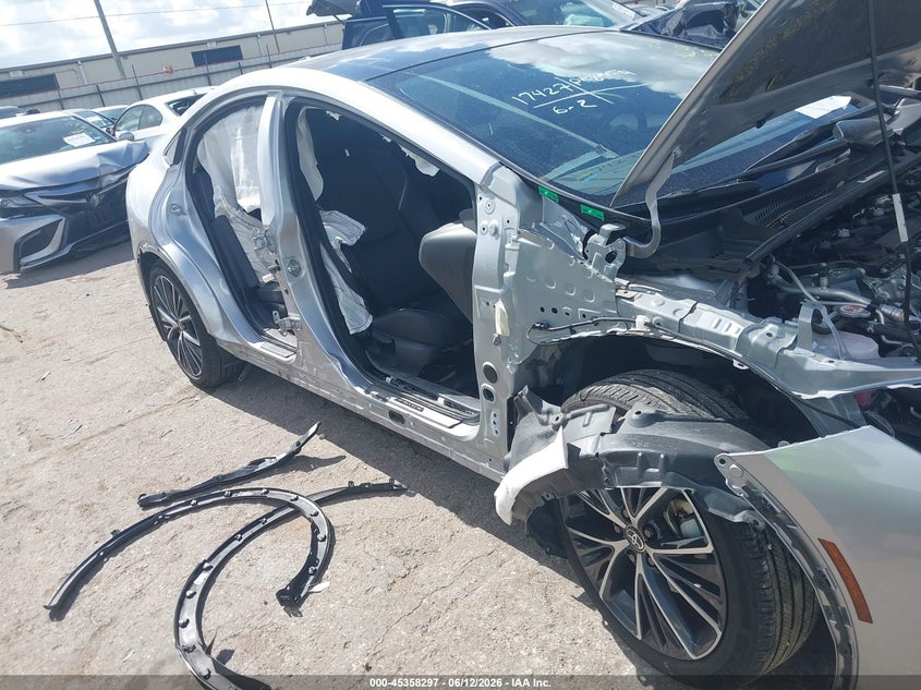 2024 Toyota Prius VIN JTDADABU5R3021727 IAAI salvage auction — RIGHT SIDE, Salvage Title, sold $14,100 on 2026-08-19 (photo 6)