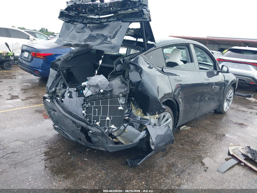 2026 Tesla Model y VIN 7SAYGDEE1TA466407 IAAI salvage auction — REAR END, Salvage Title, sold $7,300 on 2026-07-22 (photo 4)