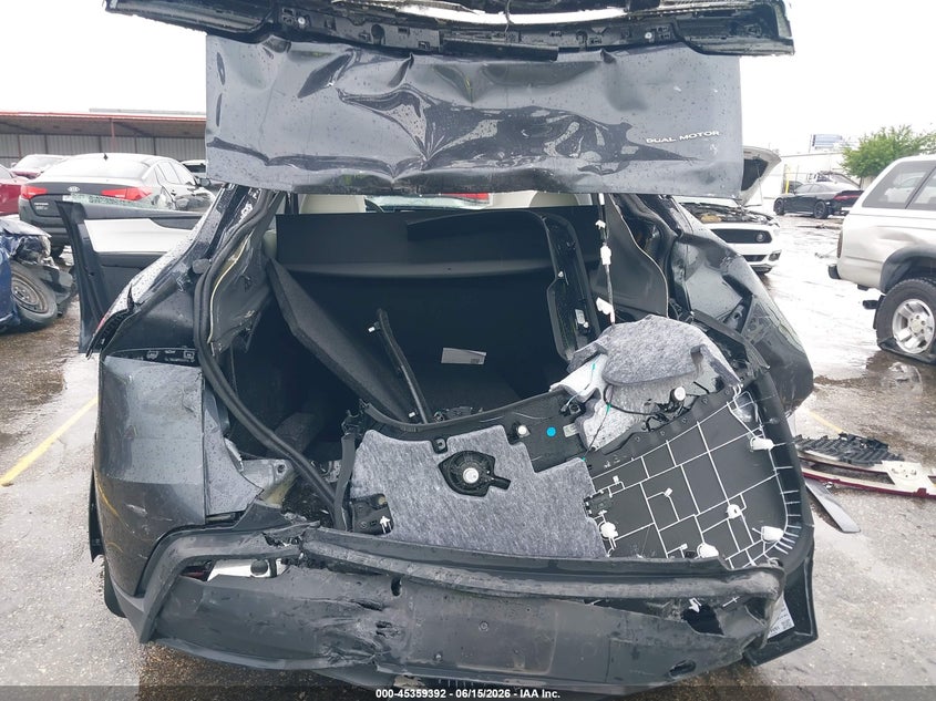 2026 Tesla Model y VIN 7SAYGDEE1TA466407 IAAI salvage auction — REAR END, Salvage Title, sold $7,300 on 2026-07-22 (photo 6)