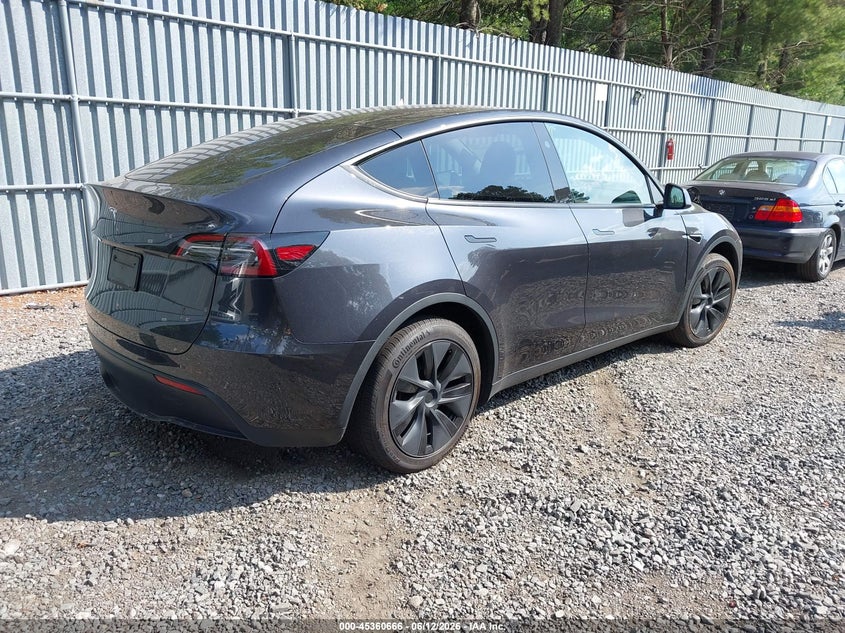2025 Tesla Model y VIN 7SAYGDEDXSF270085 IAAI salvage auction — FRONT END, Salvage Title, sold $11,300 on 2026-07-29 (photo 4)