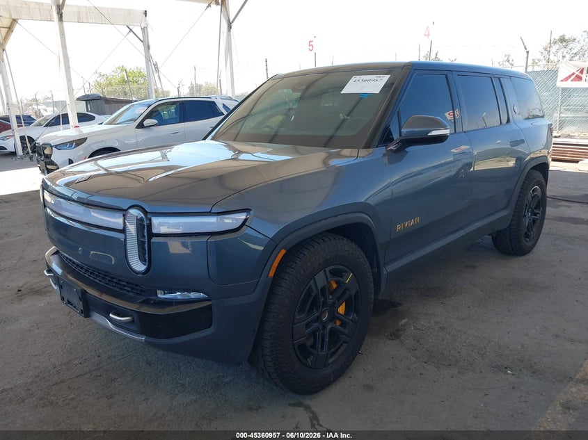 2023 Rivian R1s VIN 7PDSGABA6PN013227 IAAI salvage auction — ALL OVER, Salvage (California), sold $30,000 on 2026-08-10 (photo 2)