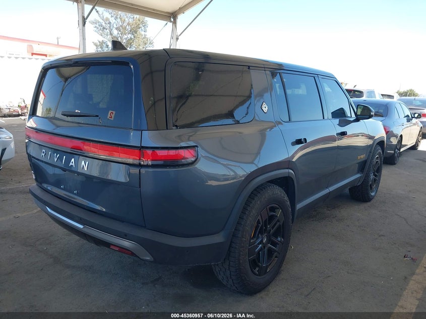 2023 Rivian R1s VIN 7PDSGABA6PN013227 IAAI salvage auction — ALL OVER, Salvage (California), sold $30,000 on 2026-08-10 (photo 4)