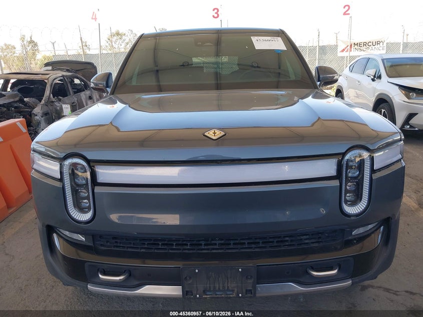 2023 Rivian R1s VIN 7PDSGABA6PN013227 IAAI salvage auction — ALL OVER, Salvage (California), sold $30,000 on 2026-08-10 (photo 6)