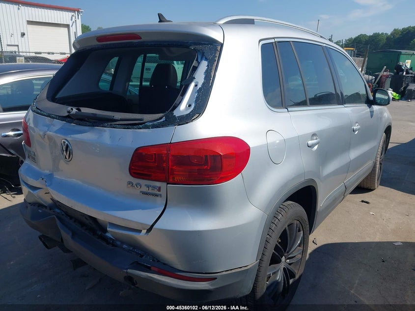 2014 Volkswagen Tiguan VIN WVGBV3AX0EW540858 IAAI salvage auction — REAR END, Wait Title, sold $1,600 on 2026-08-17 (photo 4)