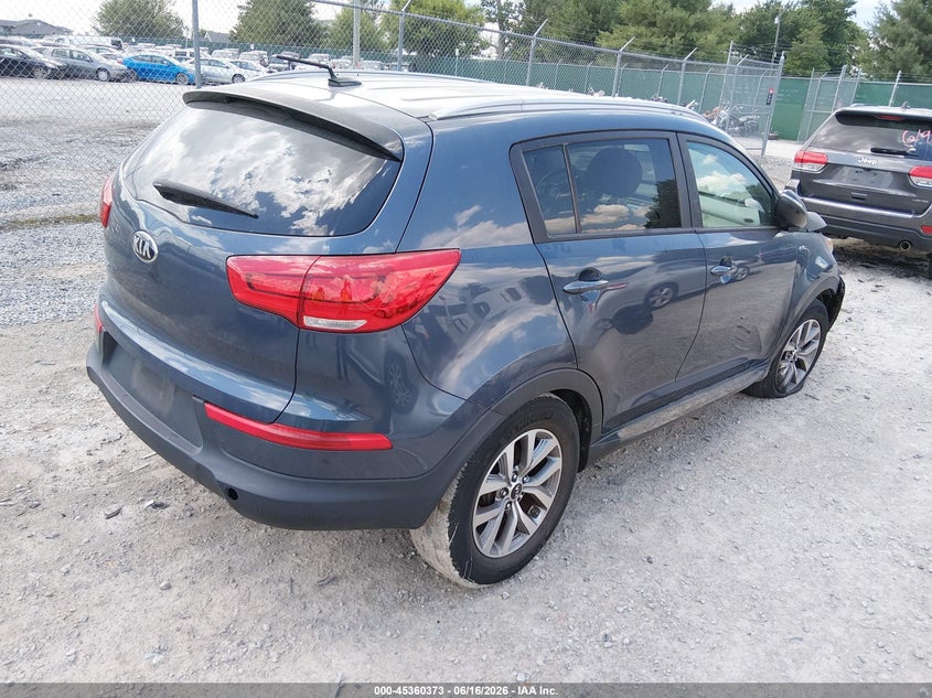 2016 Kia Sportage VIN KNDPBCACXG7811776 IAAI salvage auction — ENGINE BURN, Salvage (Idaho), sold $475 on 2026-07-13 (photo 4)