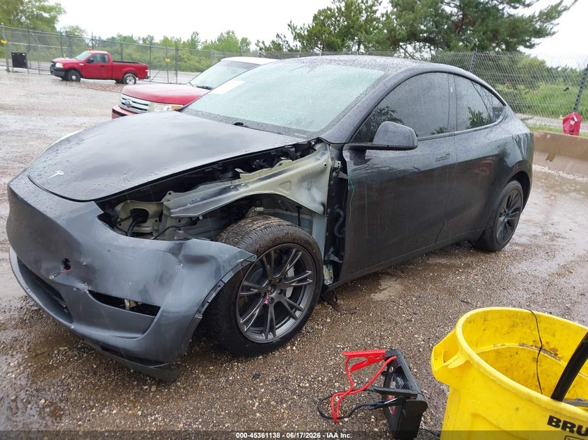 2024 Tesla Model y VIN 7SAYGDEE5RF161052 IAAI salvage auction — LEFT SIDE, Salvage (Wisconsin), sold $16,325 on 2026-07-09 (photo 2)
