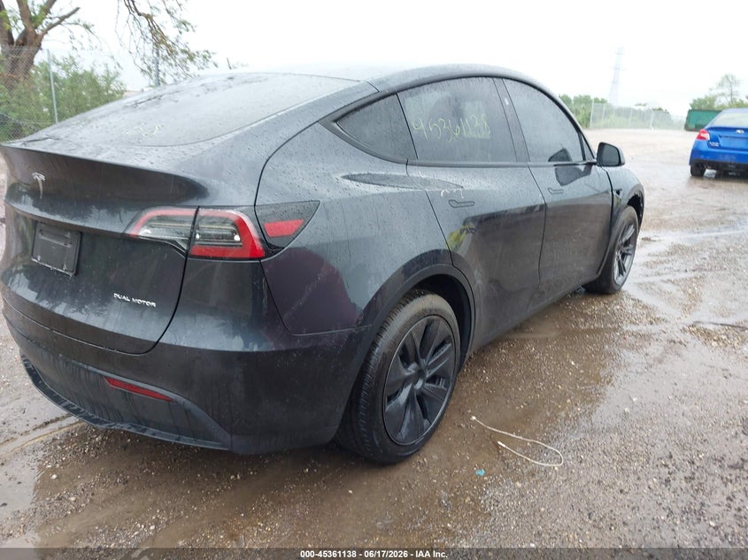 2024 Tesla Model y VIN 7SAYGDEE5RF161052 IAAI salvage auction — LEFT SIDE, Salvage (Wisconsin), sold $16,325 on 2026-07-09 (photo 4)