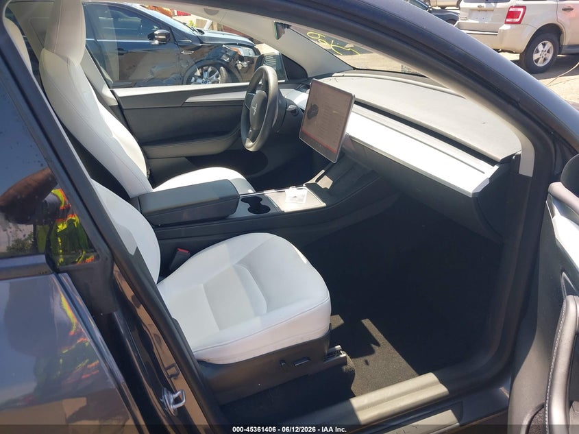 2023 Tesla Model y VIN 7SAYGDEE2PF692514 IAAI salvage auction — RIGHT FRONT, Salvage (Virginia), sold $12,000 on 2026-07-08 (photo 5)