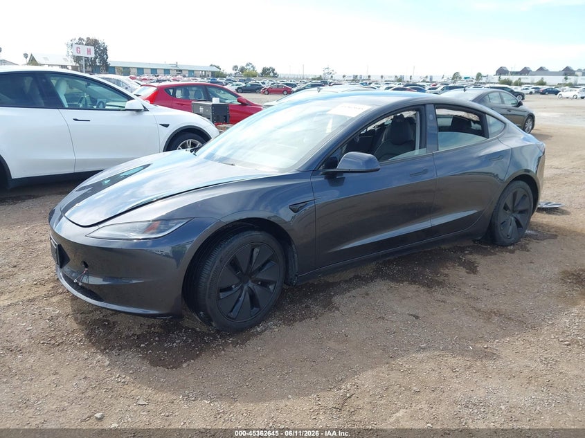 2025 Tesla Model 3 VIN 5YJ3E1EA9SF977986 IAAI salvage auction — RIGHT REAR, Salvage Title, sold $8,800 on 2026-07-29 (photo 2)
