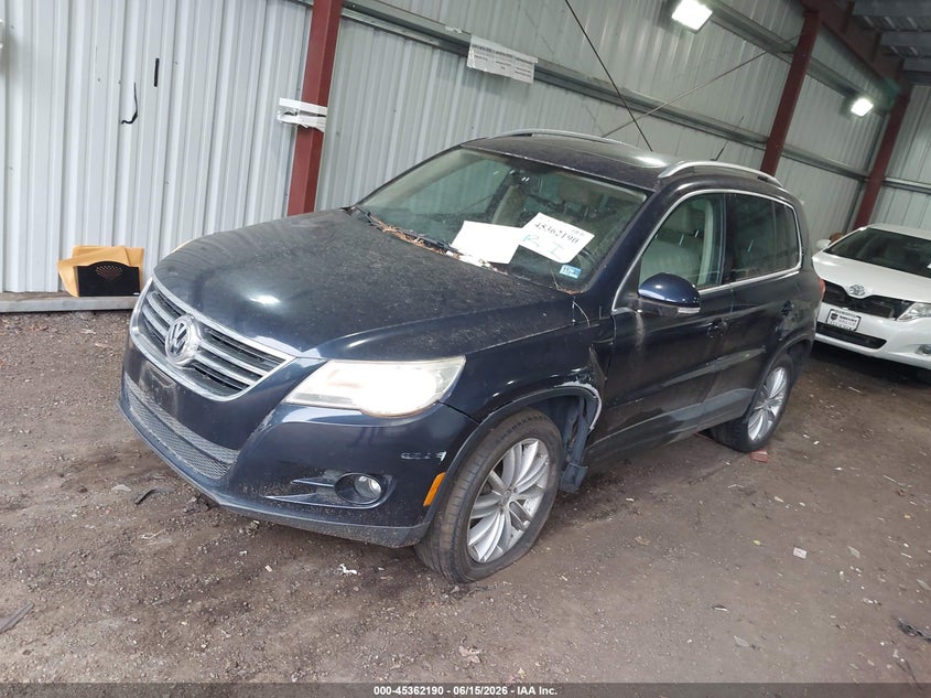 2011 Volkswagen Tiguan VIN WVGBV7AX2BW534241 IAAI salvage auction — LEFT SIDE, Clear (Virginia), sold $175 on 2026-07-23 (photo 2)