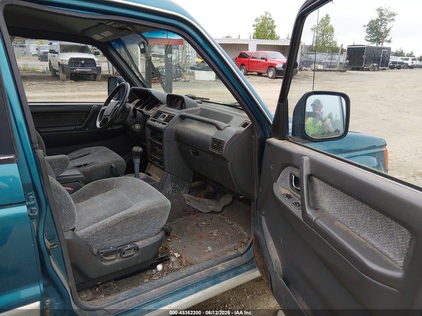 1995 Mitsubishi Montero VIN JA4MR41H0SJ014183 IAAI salvage auction — NORMAL WEAR, Original (Alaska), sold $100 on 2026-08-21 (photo 5)
