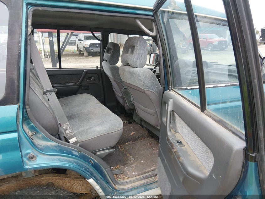 1995 Mitsubishi Montero VIN JA4MR41H0SJ014183 IAAI salvage auction — NORMAL WEAR, Original (Alaska), sold $100 on 2026-08-21 (photo 8)