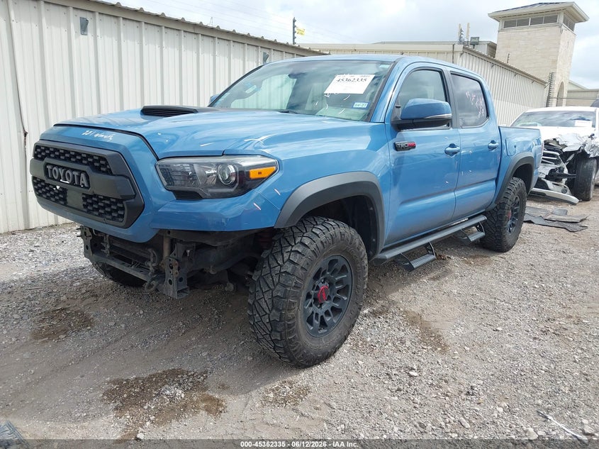 2018 Toyota Tacoma VIN 5TFCZ5AN2JX143891 IAAI salvage auction — FRONT & REAR, Original (Texas), sold $10,800 on 2026-07-16 (photo 2)