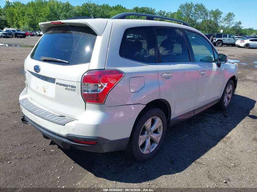 2014 Subaru Forester VIN JF2SJAHC9EH479782 IAAI salvage auction — FRONT & REAR, Salvage (Idaho), sold $950 on 2026-07-08 (photo 4)