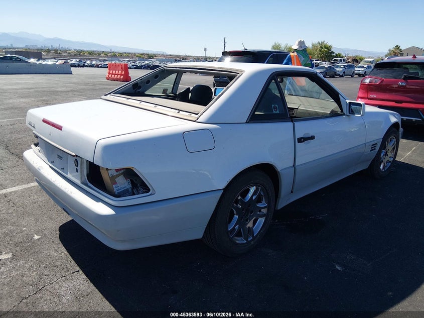 1991 Mercedes-benz 500 VIN WDBFA66E3MF035968 IAAI salvage auction — NORMAL WEAR, Clear (Nevada), sold $325 on 2026-07-24 (photo 4)