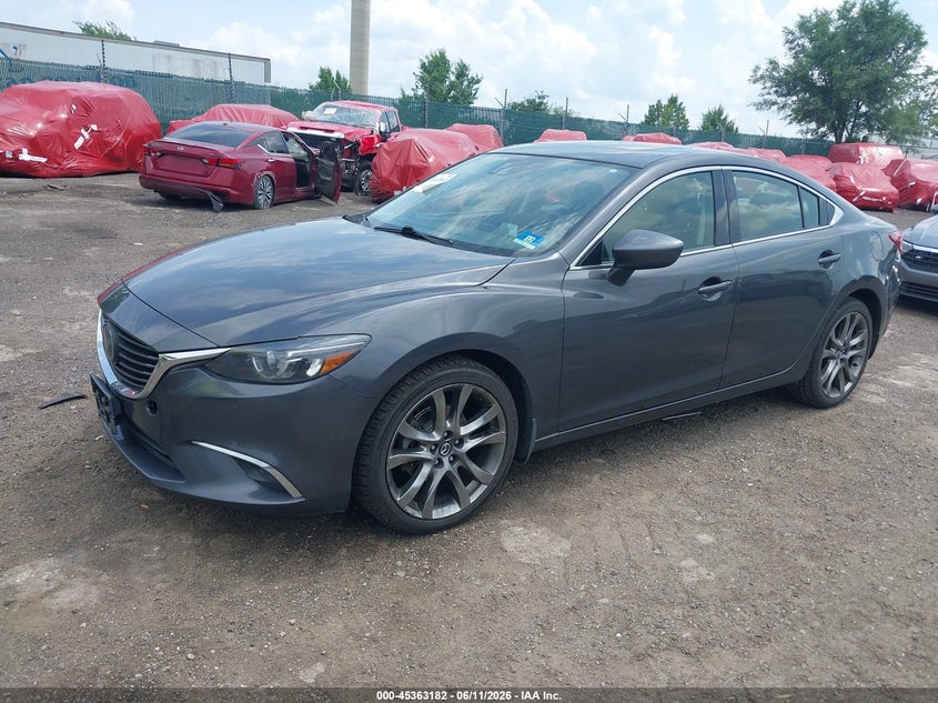 2016 Mazda VIN JM1GJ1W57G1440290 IAAI salvage auction — SIDE, Salvage Title, sold $1,350 on 2026-07-17 (photo 2)