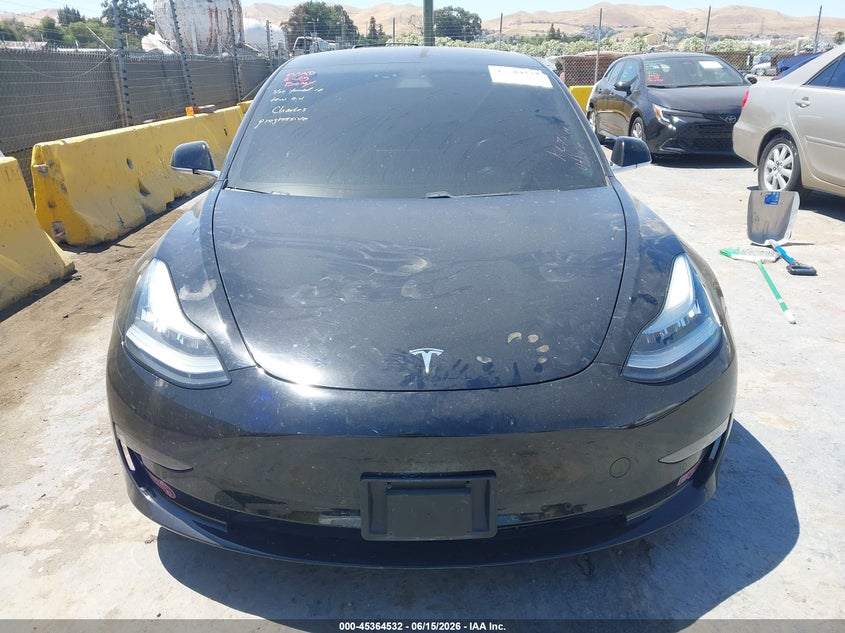 2018 Tesla Model 3 VIN 5YJ3E1EA5JF034475 IAAI salvage auction — UNKNOWN, Salvage (California), sold $4,250 on 2026-07-09 (photo 6)