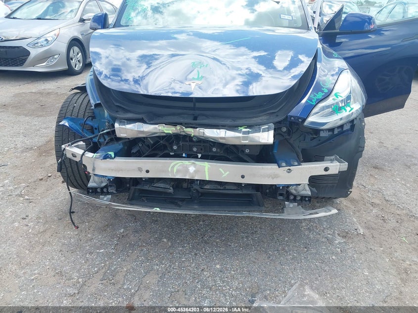 2023 Tesla Model y VIN 7SAYGDEE5PA159859 IAAI salvage auction — FRONT END, Salvage (Texas), sold $13,100 on 2026-07-15 (photo 6)