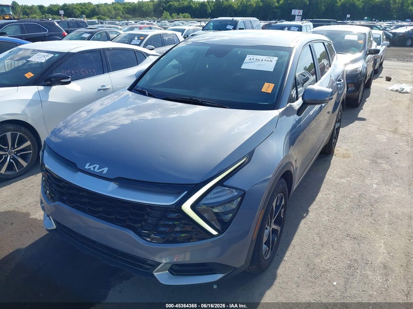 2023 Kia Sportage VIN 5XYK33AF5PG131580 IAAI salvage auction — HAIL, Salvage Title, sold $9,100 on 2026-07-22 (photo 6)