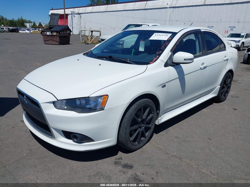 2015 Mitsubishi Lancer VIN JA32U8FW0FU014360 IAAI salvage auction — FRONT & REAR, Salvage (Texas), sold $1,050 on 2026-07-30 (photo 2)