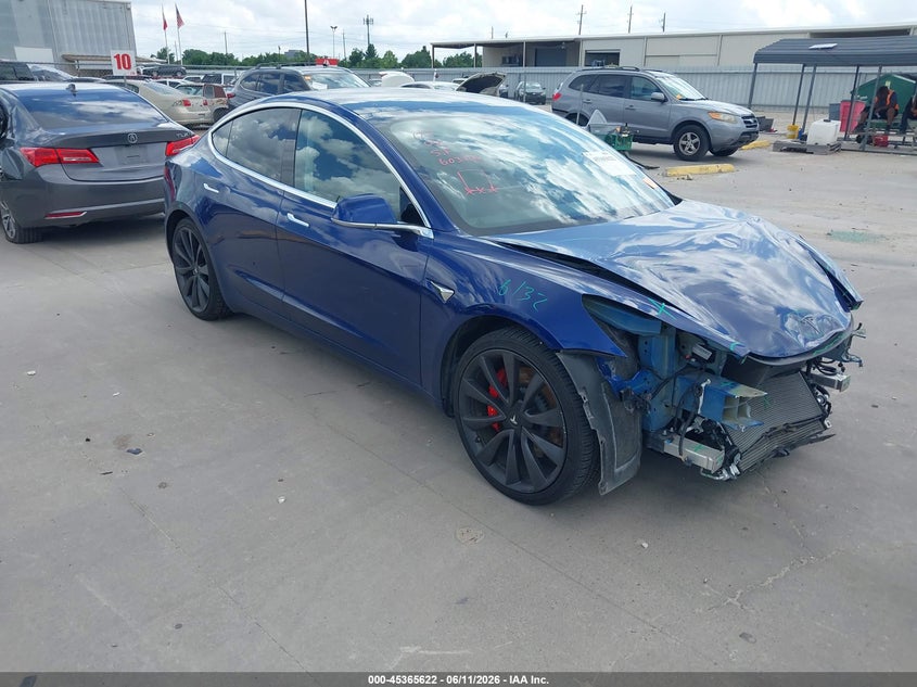 2020 Tesla Model 3 VIN 5YJ3E1EC7LF603136 — IAAI salvage auction photo