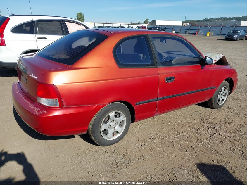 2000 Hyundai Accent VIN KMHCF35GXYU014751 IAAI salvage auction — RIGHT FRONT, Salvage (Idaho), sold $100 on 2026-07-07 (photo 4)