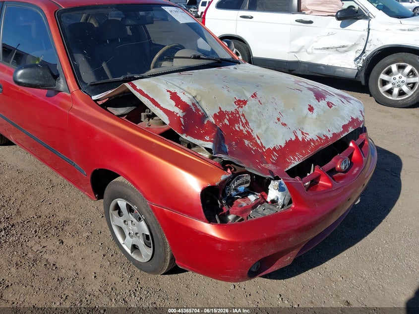 2000 Hyundai Accent VIN KMHCF35GXYU014751 IAAI salvage auction — RIGHT FRONT, Salvage (Idaho), sold $100 on 2026-07-07 (photo 6)