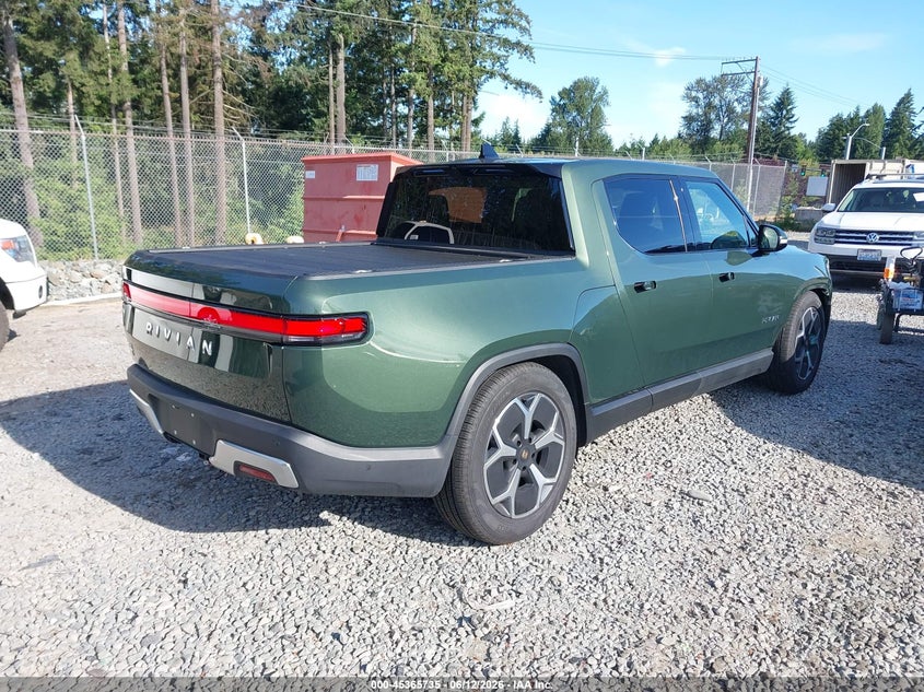 2023 Rivian R1t VIN 7FCTGBAA6PN029439 IAAI salvage auction — RIGHT FRONT, Bill Of Sale (Washington), sold $27,750 on 2026-08-12 (photo 4)