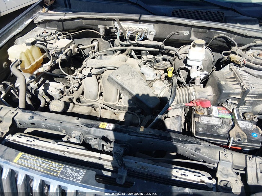 2008 Mercury Mariner VIN 4M2CU91108KJ05922 IAAI salvage auction — ENGINE DAMAGE, Clear (Colorado), sold $250 on 2026-07-08 (photo 6)