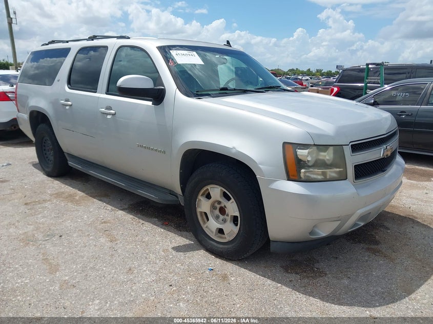 2011 Chevrolet Suburban 1500 VIN 1GNSCJE04BR112546 — IAAI salvage auction photo