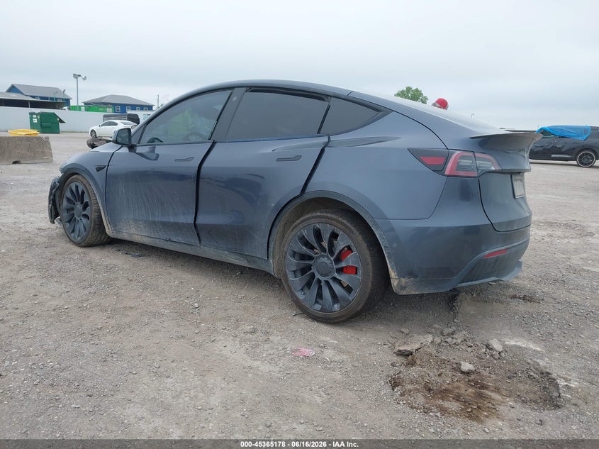 2022 Tesla Model y VIN 7SAYGDEF4NF540644 IAAI salvage auction — SIDE, Salvage Title, sold $2,700 on 2026-08-19 (photo 3)