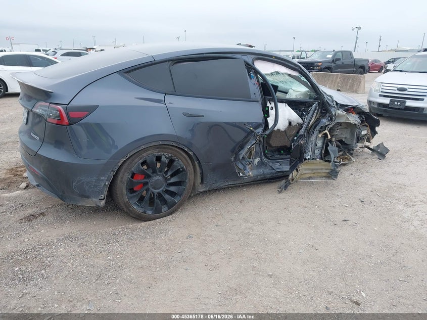 2022 Tesla Model y VIN 7SAYGDEF4NF540644 IAAI salvage auction — SIDE, Salvage Title, sold $2,700 on 2026-08-19 (photo 4)