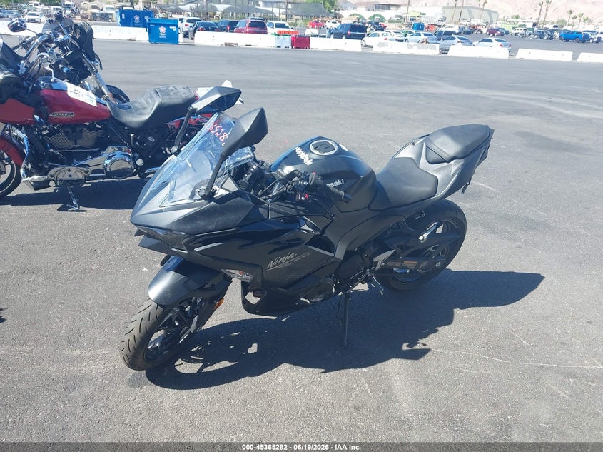 2026 Kawasaki Ninja VIN ML5EXGH14TDA80839 IAAI salvage auction — LEFT & RIGHT, Wait Title, sold $1,800 on 2026-09-03 (photo 2)