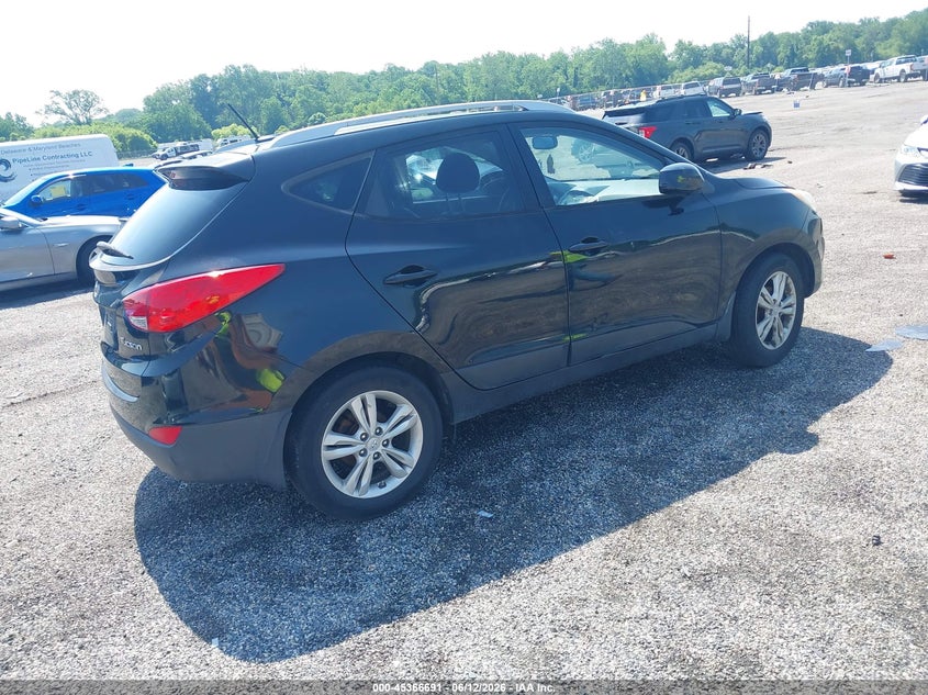 2011 Hyundai Tucson VIN KM8JU3AC3BU128274 IAAI salvage auction — NORMAL WEAR, Clear (Delaware), sold $1,400 on 2026-07-13 (photo 4)