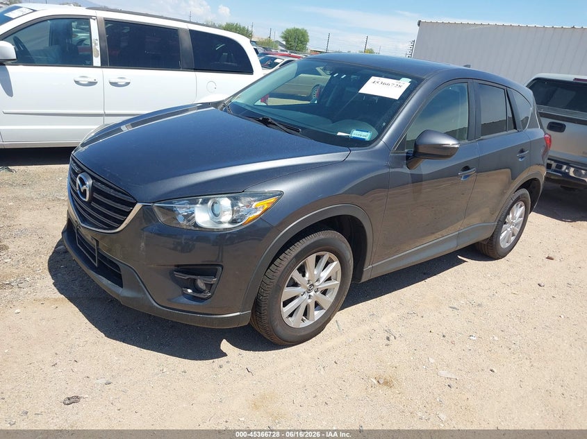 2016 Mazda Cx-5 VIN JM3KE4CYXG0830716 IAAI salvage auction — NORMAL WEAR, Clear (District Of Columbia), sold $2,725 on 2026-07-09 (photo 2)