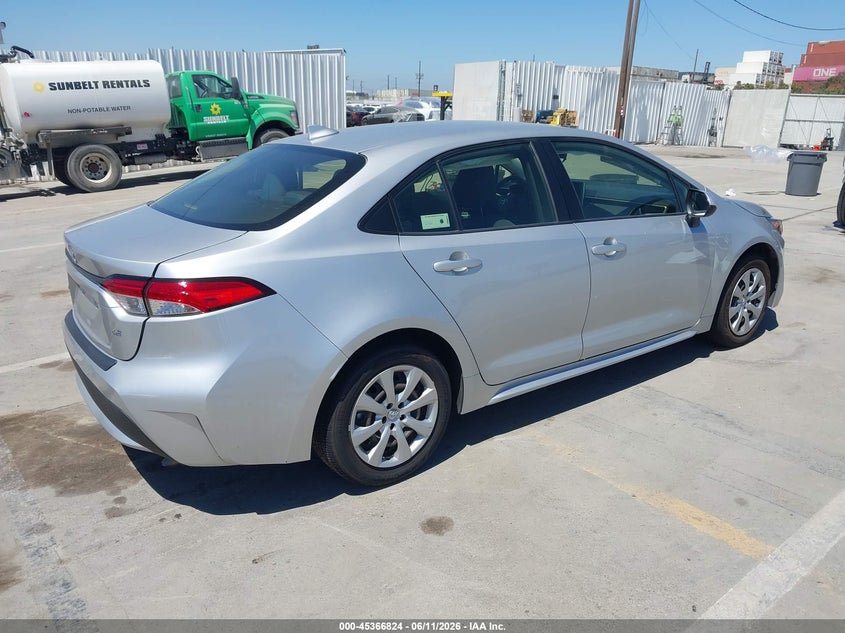 2021 Toyota Corolla VIN JTDEPMAE9MJ148019 IAAI salvage auction — LEFT SIDE, Salvage (California), sold $4,350 on 2026-07-08 (photo 4)