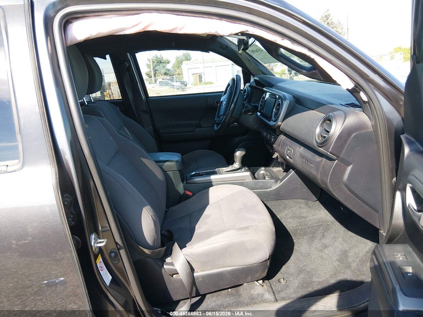 2019 Toyota Tacoma VIN 3TMCZ5AN3KM277851 IAAI salvage auction — ROLLOVER, Salvage Title, sold $8,750 on 2026-08-24 (photo 5)