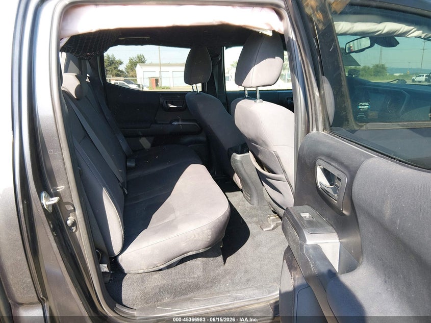 2019 Toyota Tacoma VIN 3TMCZ5AN3KM277851 IAAI salvage auction — ROLLOVER, Salvage Title, sold $8,750 on 2026-08-24 (photo 8)