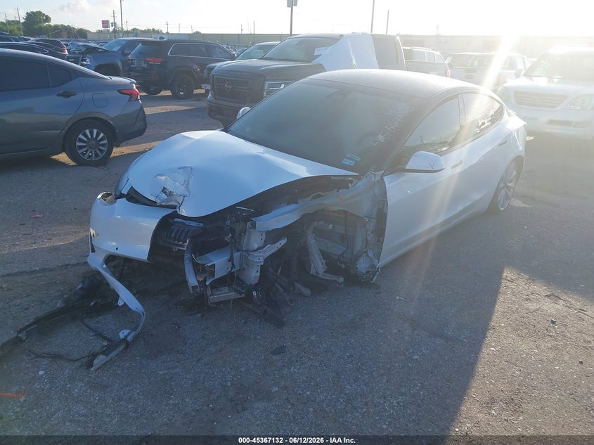 2020 Tesla Model 3 VIN 5YJ3E1EAXLF615957 IAAI salvage auction — NORMAL WEAR, Original (Texas), sold $2,275 on 2026-07-22 (photo 2)