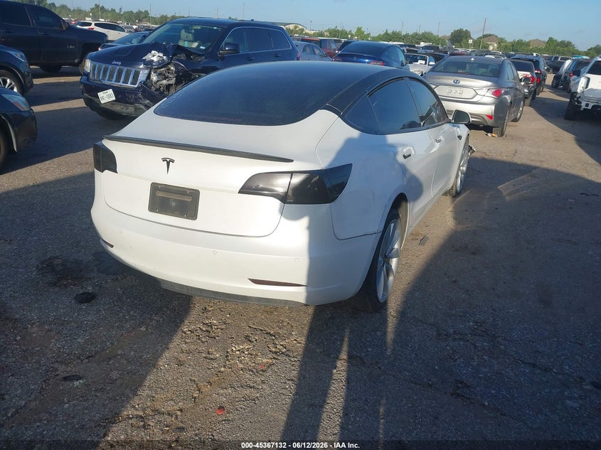 2020 Tesla Model 3 VIN 5YJ3E1EAXLF615957 IAAI salvage auction — NORMAL WEAR, Original (Texas), sold $2,275 on 2026-07-22 (photo 4)