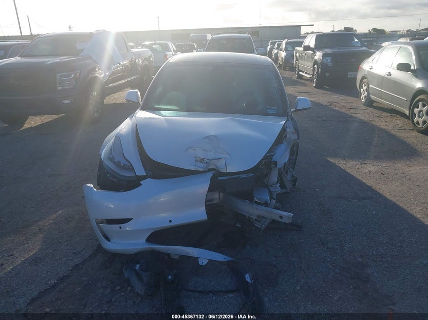 2020 Tesla Model 3 VIN 5YJ3E1EAXLF615957 IAAI salvage auction — NORMAL WEAR, Original (Texas), sold $2,275 on 2026-07-22 (photo 6)