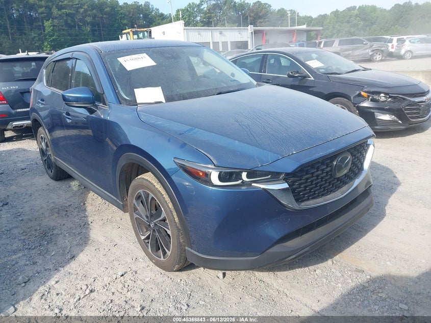 2022 Mazda Cx-5 VIN JM3KFBDM4N1582144 IAAI salvage auction — SIDE, Salvage Title, sold $7,100 on 2026-07-26 (photo 1)